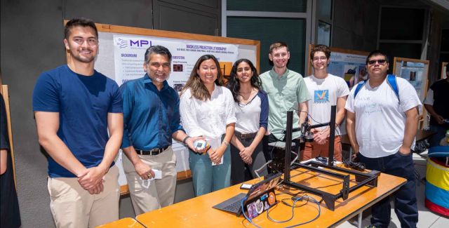 photo of students with capstone project